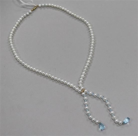 A single strand freshwater pearl and blue topaz tassel drop necklace, with 9ct gold clasp, approx. 60cm.
